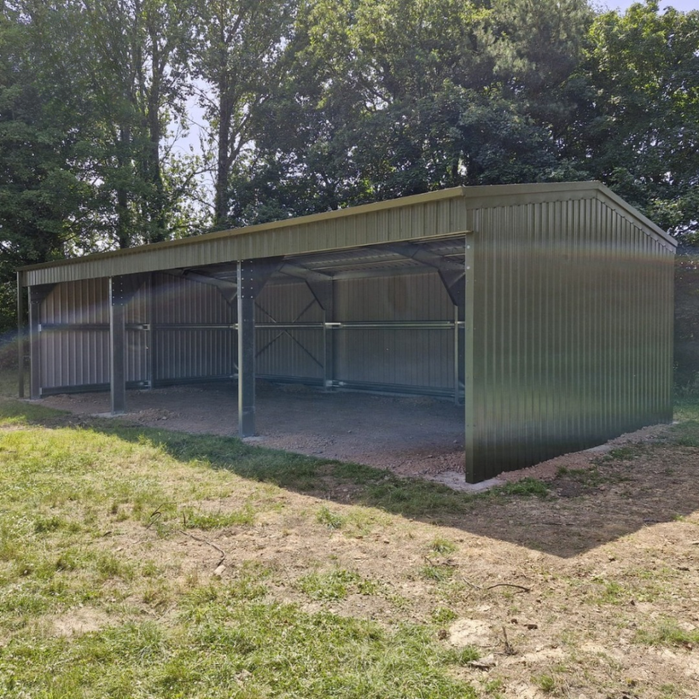 Front diagonal view of an olive green open store in east sussex 
