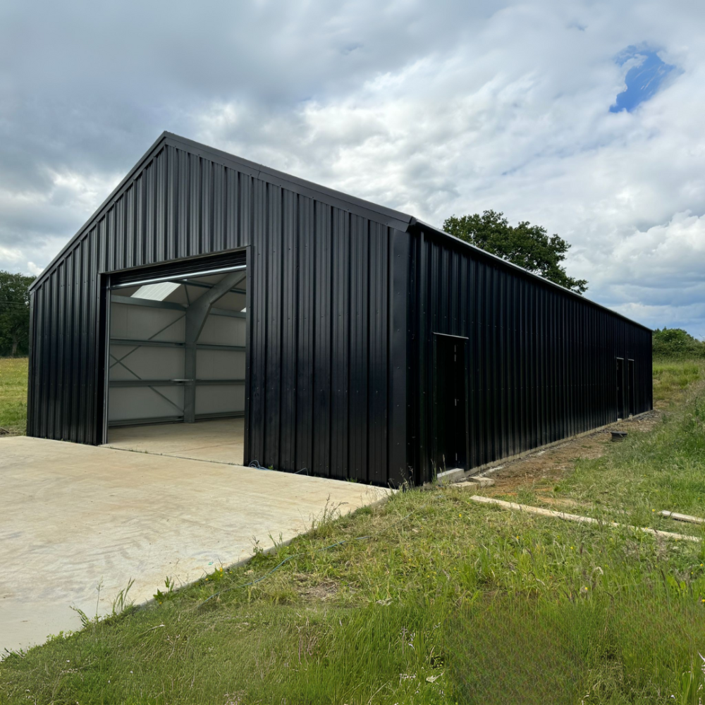 Black insulated industrial kit building from Kit Buildings UK