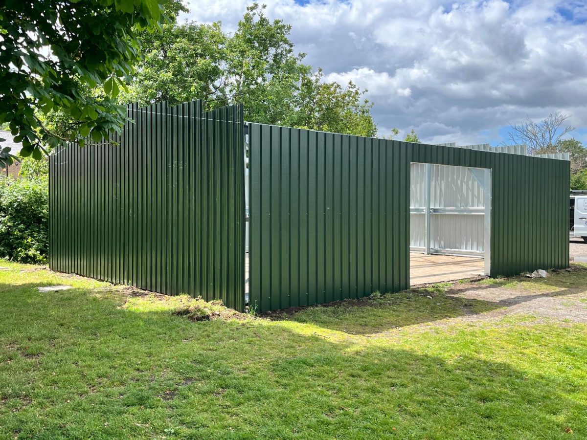 Day two - the juniper green cladding has been applied